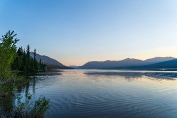 Fototapeta na wymiar Sunset over Lake McDonald in Glacier National Park in Montana on a summer evening