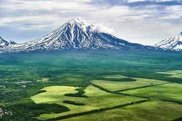 Kamchatka Peninsula, Russia. Tourism and mountaineering to the volcanoes of Kamchatka - 472043700