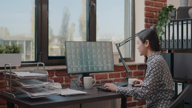 Close up of person looking at stock market statistics on computer, analyzing crypto currency exchange. Entrepreneur using global trade analysis to invest money for company growth.