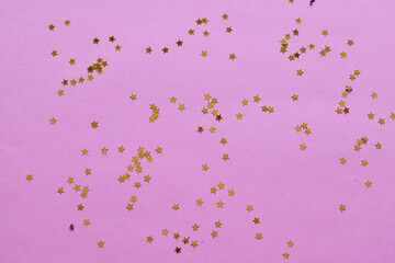 NEW YEAR and Christmas Stars background. Different colours. Christmas decoration. Symbol of holiday. Stars.Top view flatlay . background for children's party.