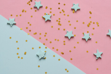 NEW YEAR and Christmas Stars background. Different colours. Christmas decoration. Symbol of holiday. Stars.Top view flatlay . background for children's party.