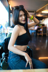 Portrait of Young beautiful asian woman in the coffee shop