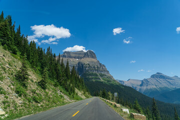 View from Going to the Sun Road near Logan Pass in Glacier National Park, Montana on a sunny summer...