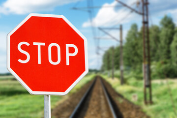 Stop sign background. Railway landscape. Caution Train. Attention danger.