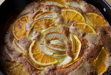 close up of apple and orange pie view from above