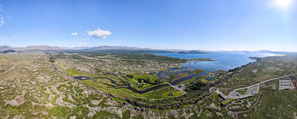 View of Thingvellir national park, Iceland's parliament, the Thingvellir Church and the ruins of...
