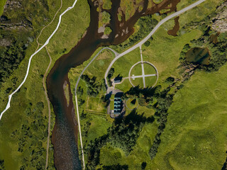 View of Thingvellir national park, Iceland's parliament, the Thingvellir Church and the ruins of old stone shelters, hikes and lake