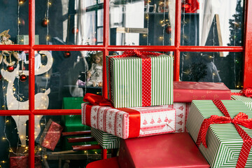 Stacks of Christmas presents, New Year's gifts in the shop window