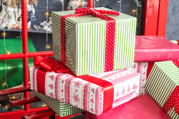 Stacks of Christmas presents, New Year's gifts in the shop window