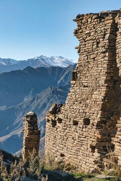 Goorskaya Bashnya with mountain range in background, Dagestan, Russia