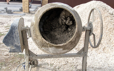 Concrete mixer at a construction site.
