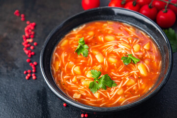 minestrone red tmato soup beans and vegetables meal snack on the table copy space food background rustic. top view keto or paleo diet