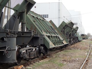 A freight  train for transporting iron. Special wagons for the transport of sheet metal.  - 472058557