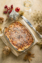 italian traditional lasagna over christmas table