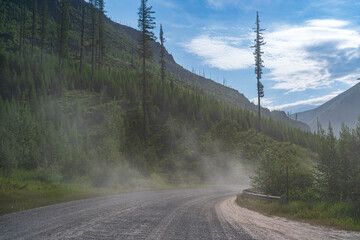 North Fork Road section headed to Bowman Lake and Kintla Lake in Glacier National Park near Polebridge, Montana on a sunny summer day