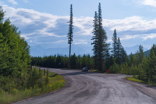 North Fork Road section headed to Bowman Lake and Kintla Lake in Glacier National Park near Polebridge, Montana on a sunny summer day