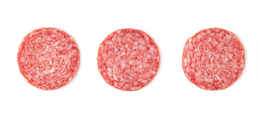 Set salami sausage slices isolated on white background, top view