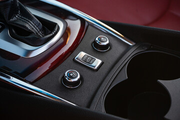 car interior button for opening and closing the roof on the convertible and buttons for adjusting...