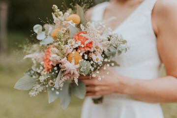 bride holding a bouquet of flowers