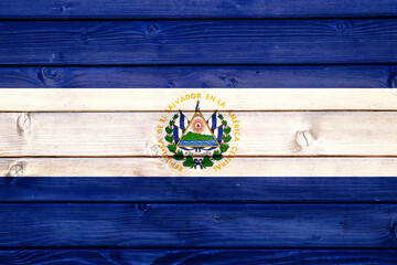 Flag of El Salvador on wooden surface