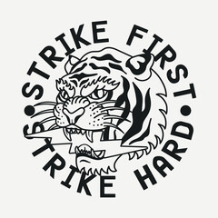 Black and White Traditional Tattoo Tiger with Lightning Illustration and Strike First Strike Hard Slogan Artwork on White Background for Apparel and Other Uses
