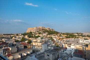 Parthenon Temple at Acropolis hill, in Athen, Greece. The famous old Acropolis is a top landmark of Athens. Scenic view of remains of ancient Athens.