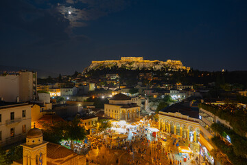 Aerial panoramic view of Monastiraki square and the ancient Parthenon on Acropolis hill in Athens,...