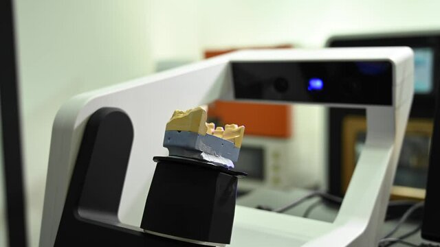 3D scanner of the jaw model. Modern high-tech dentist equipment.
