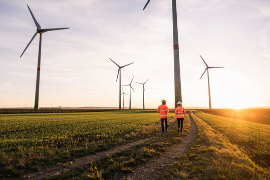 Engineers discussing at wind park