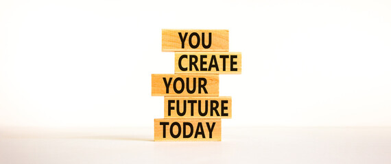 You create your future today symbol. Wooden blocks, words 'You create your future today'. Beautiful...