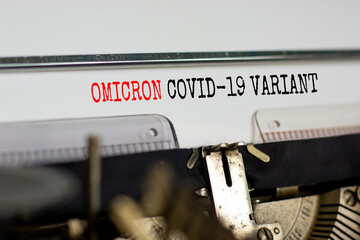 Covid-19 new omicron virus variant symbol. Concept words Omicron covid-19 variant typed on retro...