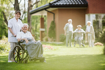 Sunny afternoon in the garden of nursing home for elderly