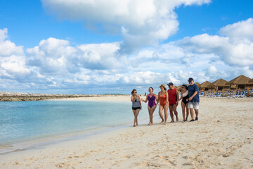 Group of friends enjoying at the beach. Bahamas