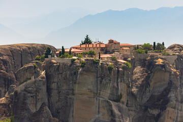 Fototapeta na wymiar Monasteries of Meteora in Kalampaka, Thessaly (Central Greece) buildings on top of giant rock formations 