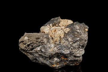 Macro stone Pyrite mineral with fluorite on a black background