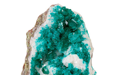 Macro mineral stone Dioptase silicate copper on a white background