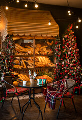 Beautiful outdoor cafe with festive decoration. Christmas celebration