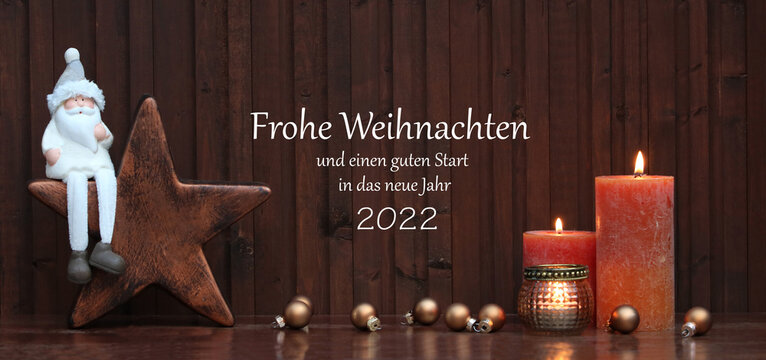 Weihnachtskarte Weihnachtsdekoration mit dem Text Frohe Weihnachten und einen guten Start in das neue Jahr 2022.