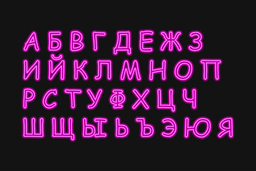 Set of neon KYRILITSA alphabet letters on black background.