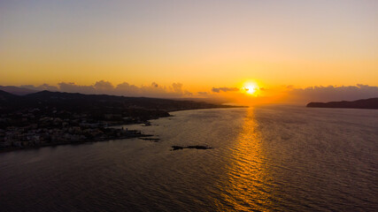 Aerial view of the beautiful city of Chania with it's old harbor and the famous lighthouse, Crete, Greece.