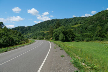 Fototapeta na wymiar Highway in beautiful Carpathian Mountains, Ukraine