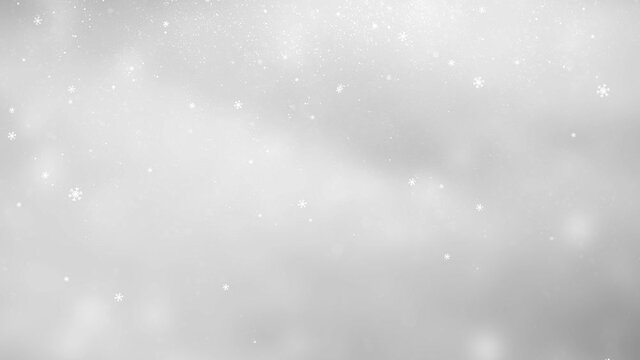 Icy winter snowflakes on bright silver bokeh glowing glitter background seamless loop animation.