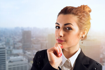 Confident businesswoman thinks about a decision to take