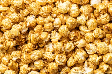 Fotobehang Lots of sweet caramel popcorn. © Jiri Hera