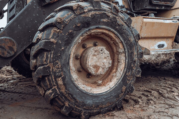 Fototapeta na wymiar Photo of a tractor wheel close-up