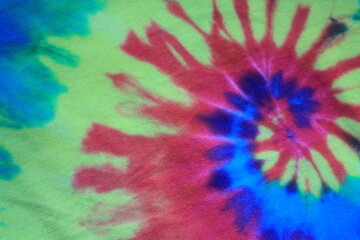 tie dye vivid bright colourful rainbow background swirl with copy space