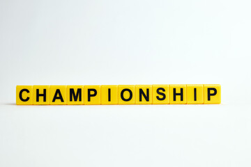 The word championship consists of individual cubes with letters.
