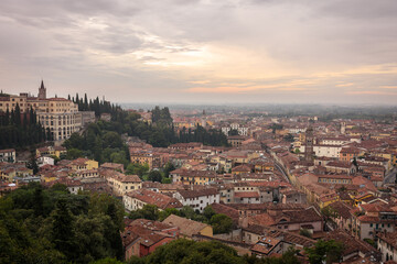 Fototapeta na wymiar Panoramic view of the beautiful city of Verona at a cloudy sunrise, Veneto region, Italy