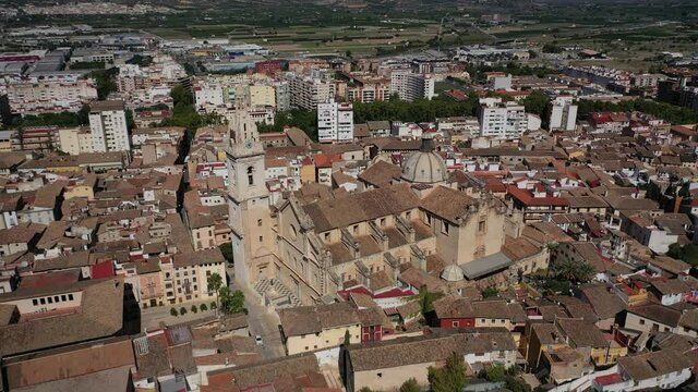 Jativa ,Valencia, Spain, Europe Aerial 4K video from drone to Spanish town of Xativa on background of Roman Catholic Basilica. (Series)