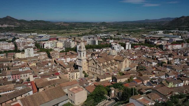 Jativa ,Valencia, Spain, Europe Aerial 4K video from drone to Spanish town of Xativa on background of Roman Catholic Basilica. (Series)